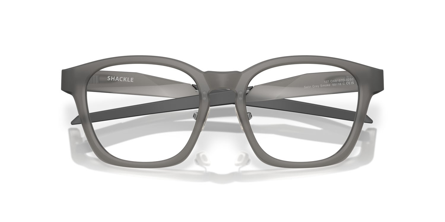 Occhiali da vista Oakley Shackle OX 8197D (819702) colore grigio fumo satinato forma quadrato lenti lente demo