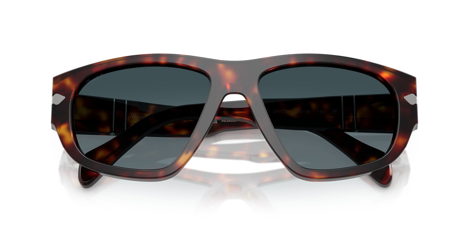 Occhiali da sole Persol PO 0050S (24/S3) colore havana forma irregolare lenti celeste sfumato blu scuro