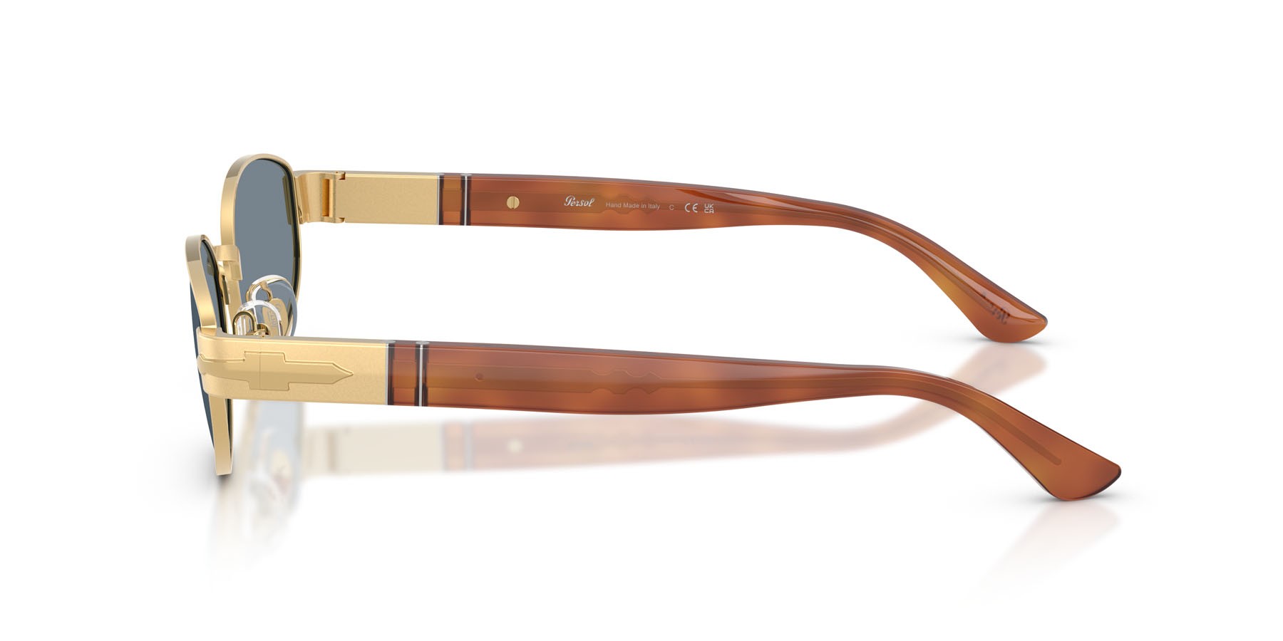 Occhiali da sole Persol PO 1024S (113256) colore oro forma ovale lenti azzurro