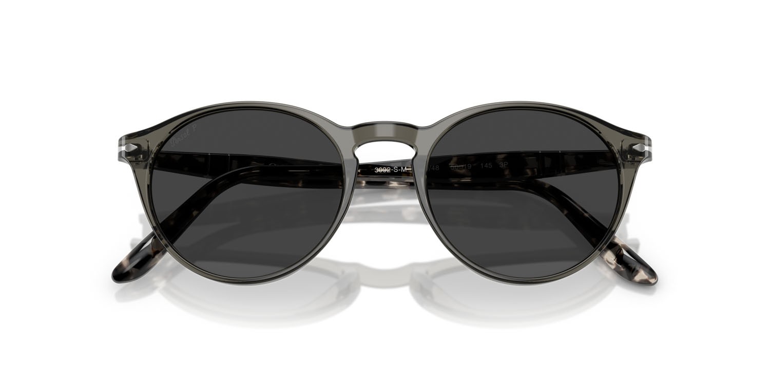 Occhiali da sole Persol PO 3092SM (121948) colore fumo forma rotondo lenti polar nera