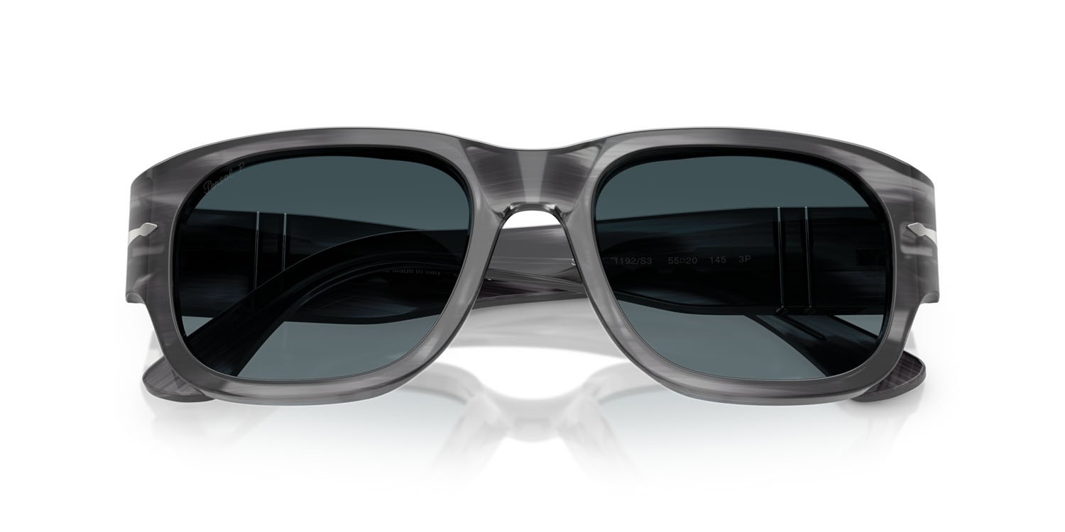 Occhiali da sole Persol PO 3380S (1192S3) colore striato grigio forma quadrato lenti celeste sfumato blu scuro