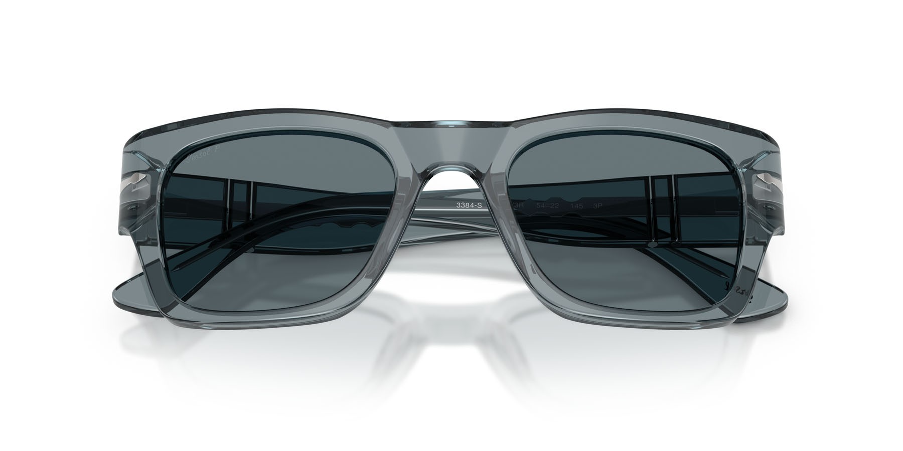 Occhiali da sole Persol PO 3384S (12273R) colore transparent ocean forma quadrato lenti polarizzata blu scuro
