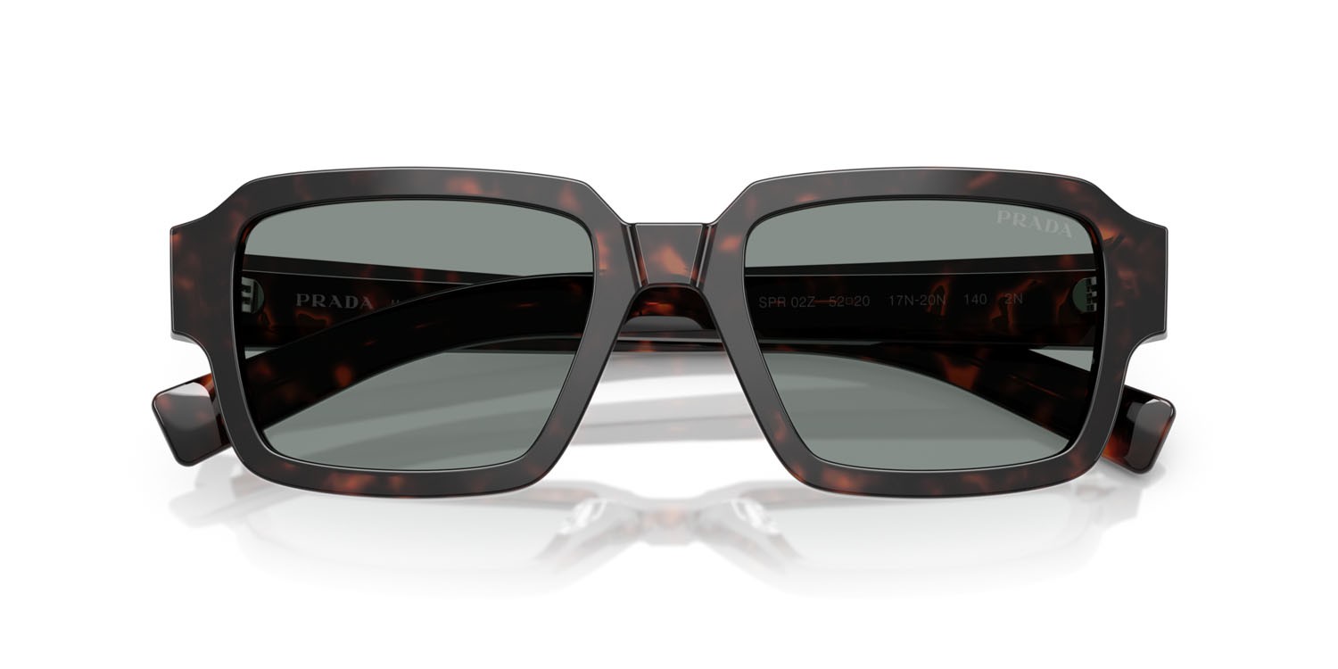 Occhiali da sole Prada PR 02ZS (17N20N) colore root tartarugato forma quadrato lenti blu