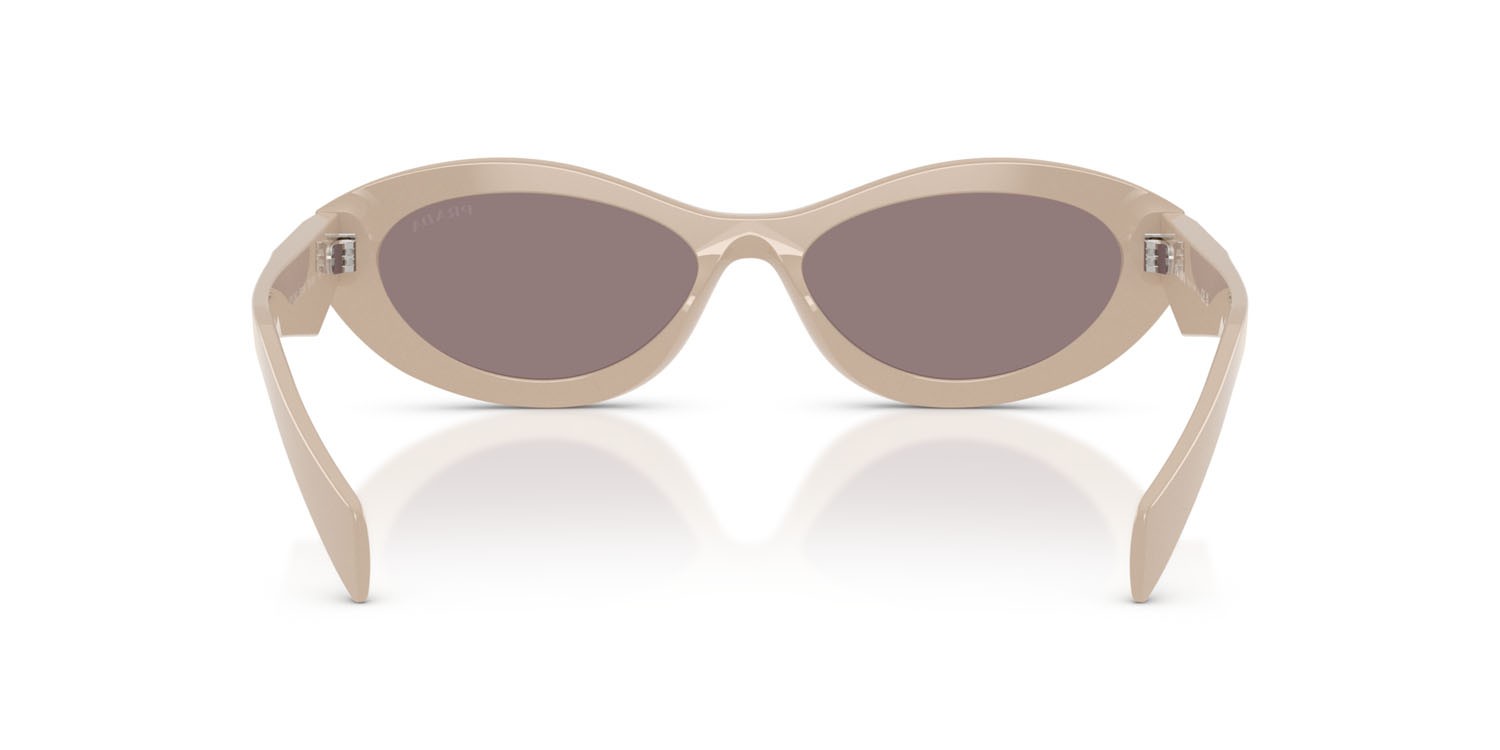 Occhiali da sole Prada PR 26ZS (25B6X1) colore rosa pastello forma irregolare lenti violetto scuro