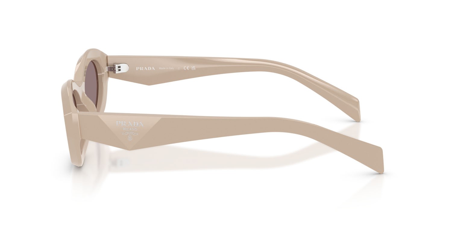 Occhiali da sole Prada PR 26ZS (25B6X1) colore rosa pastello forma irregolare lenti violetto scuro