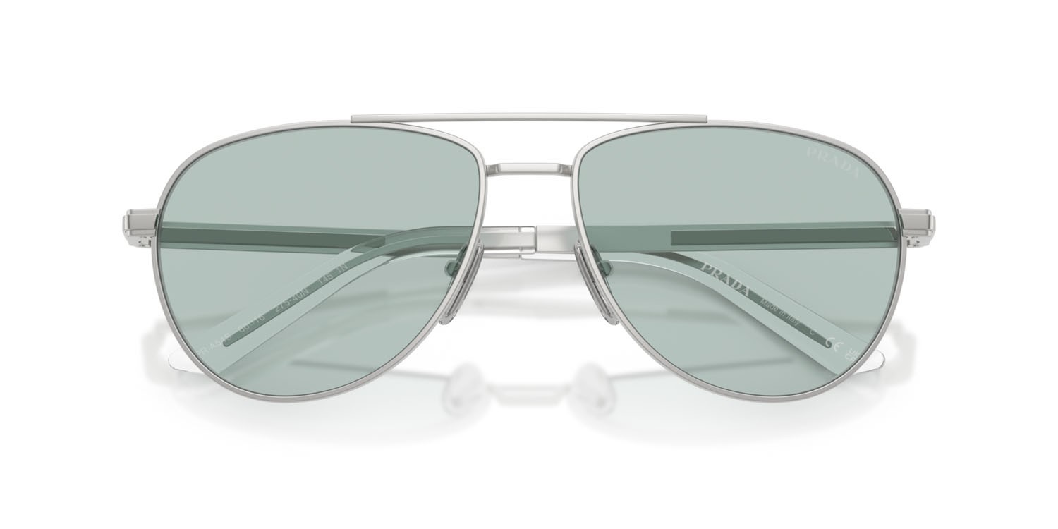 Occhiali da sole Prada PR A54S (27540N) colore argento opaco forma aviator lenti azzurro