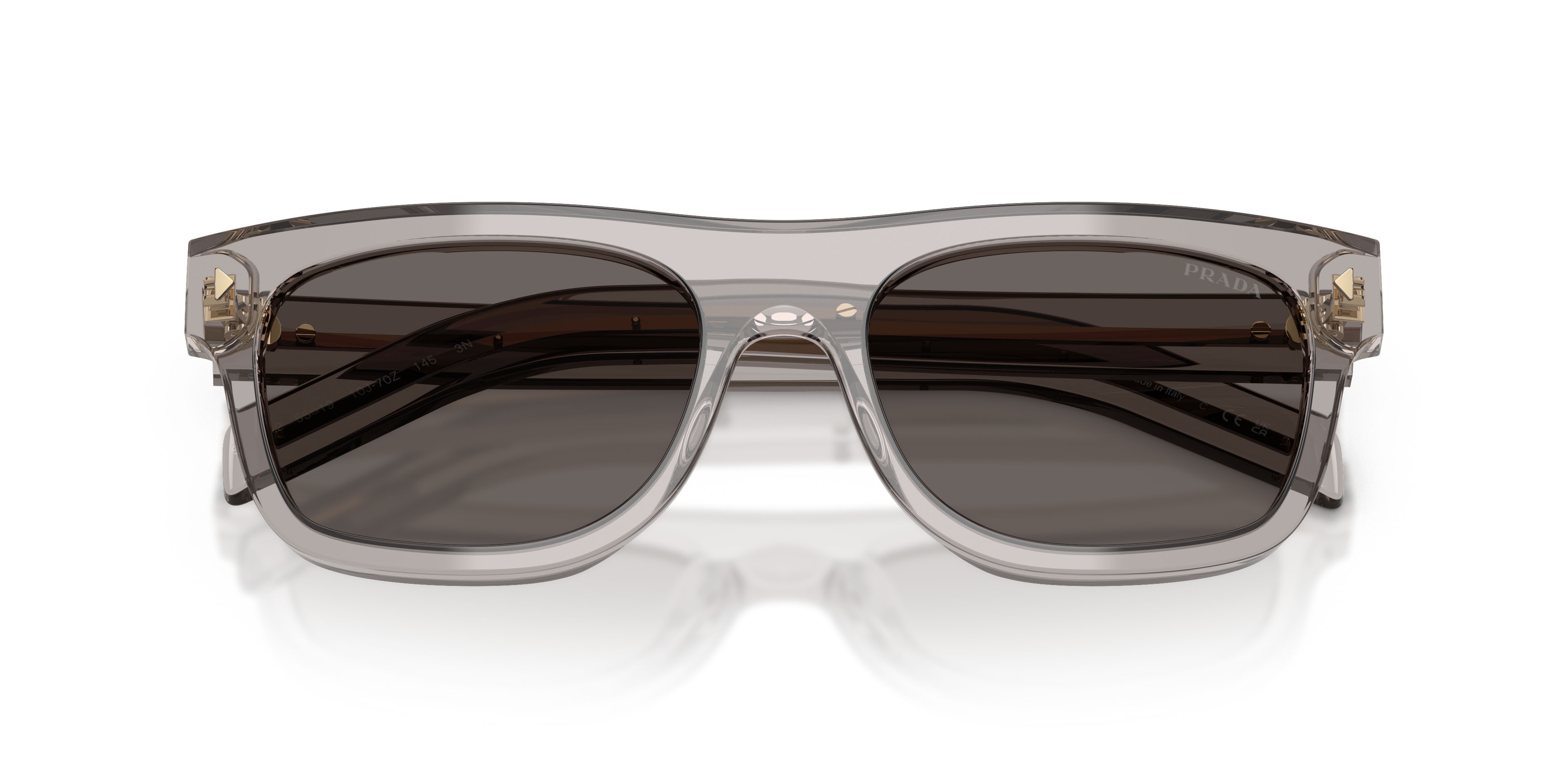 Occhiali da sole Prada PR B12S (10J70Z) colore hematite forma quadrato lenti grigio scuro