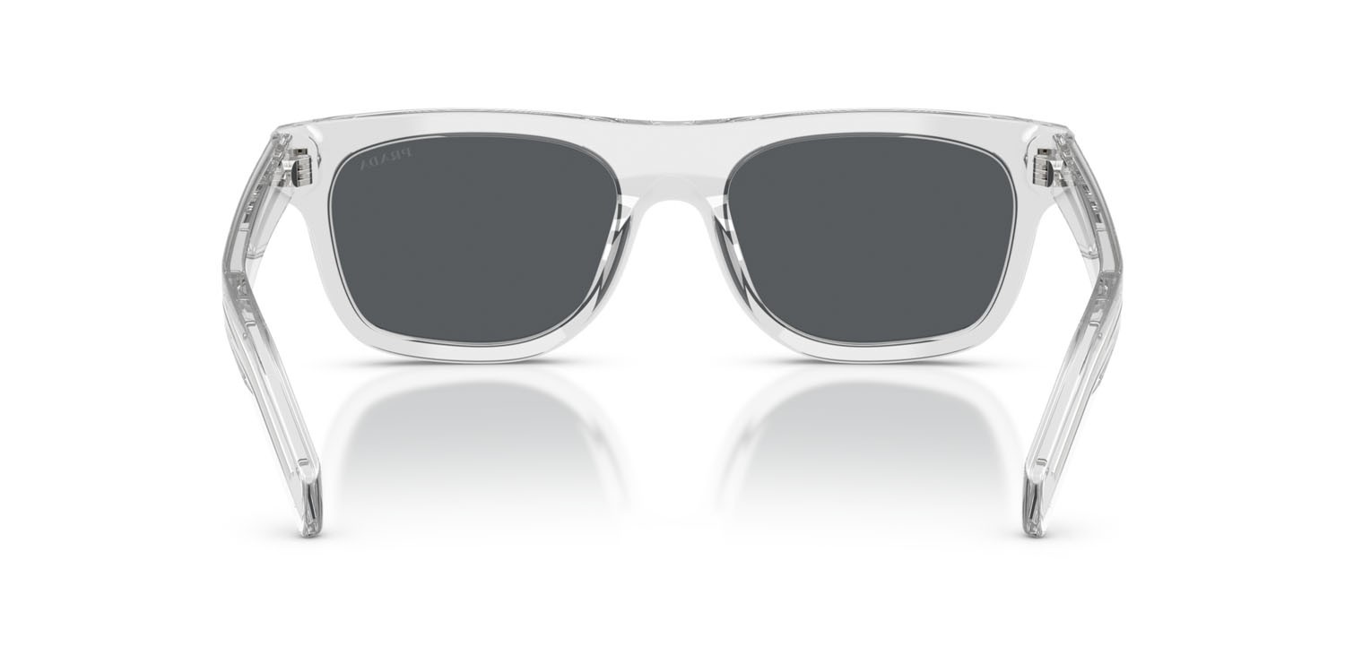 Occhiali da sole Prada PR B12S (12R07T) colore grigio trasparente forma quadrato lenti blu scuro