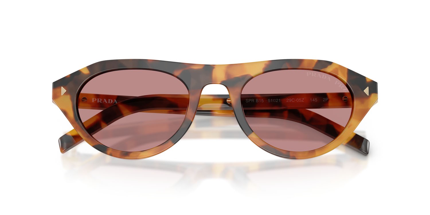 Sunglasses Prada PR B15S (29C05Z) color tortoise cannella shape irregular lenses rosa scuro polarizzato