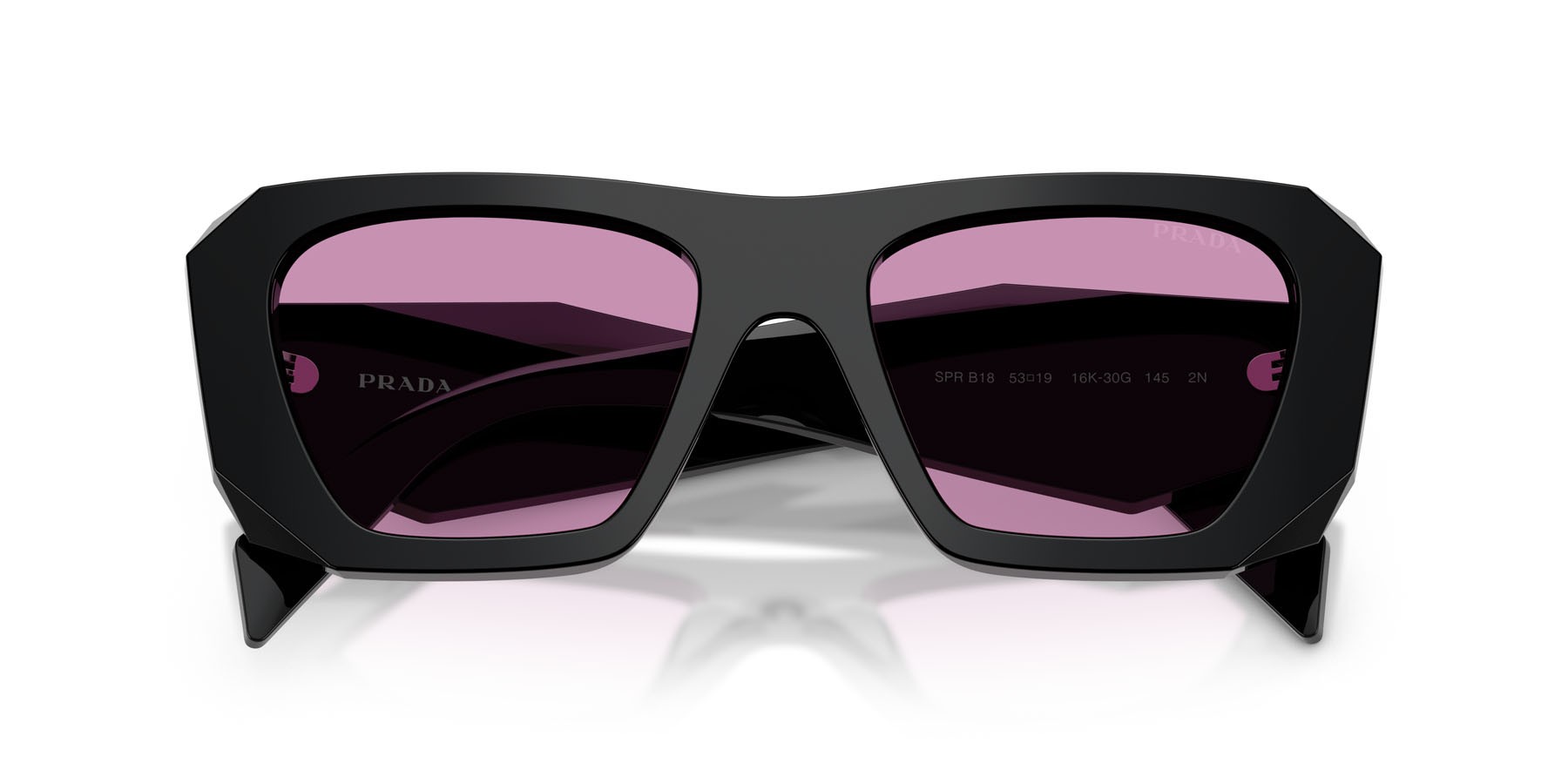 Occhiali da sole Prada PR B18S (16K30G) colore nero forma quadrato lenti violetto