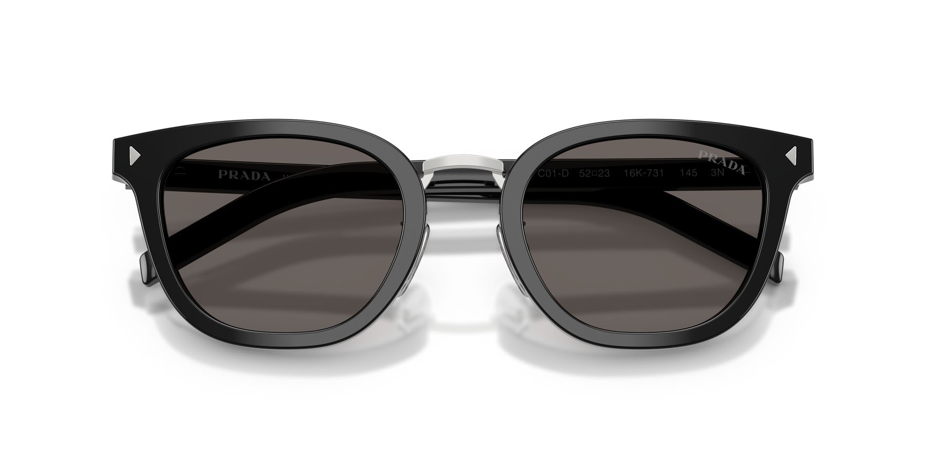 Occhiali da sole Prada PR C01SD (16K731) colore nero forma cat eye lenti grigio scuro