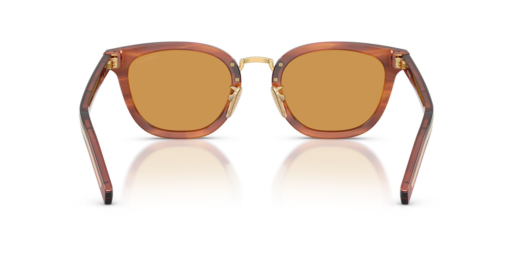 Occhiali da sole Prada PR C01SD (27F60F) colore havana cognac forma cat eye lenti photogrey extra yellow