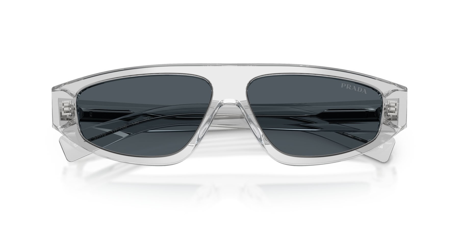 Occhiali da sole Prada PR C02S (17P70B) colore grigio crystal forma irregolare lenti grigio scuro