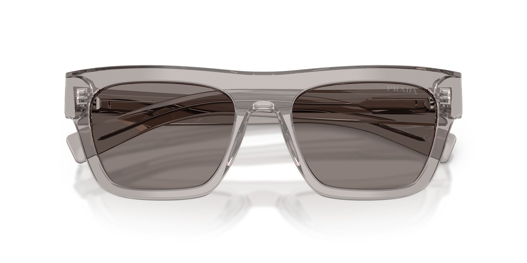 Occhiali da sole Prada PR C03S (10J80Q) colore grigio trasparente forma rettangolare lenti grigio scuro