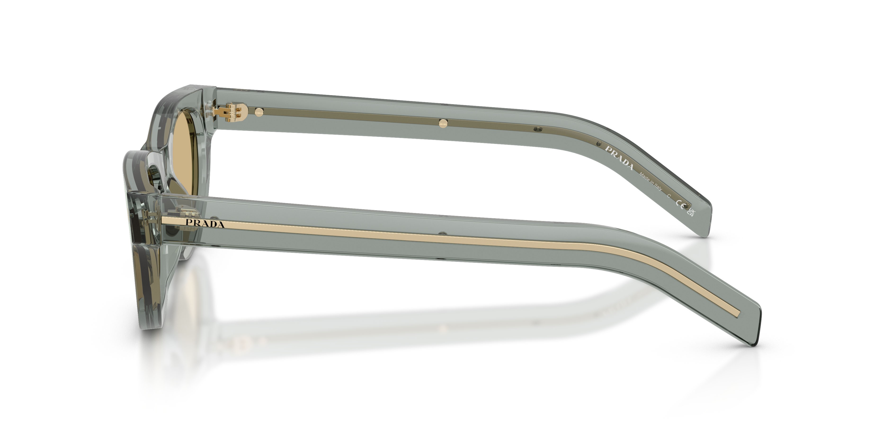 Occhiali da sole Prada PR C09S (21J70R) colore nebbia trasparente forma cat eye lenti marrone chiaro