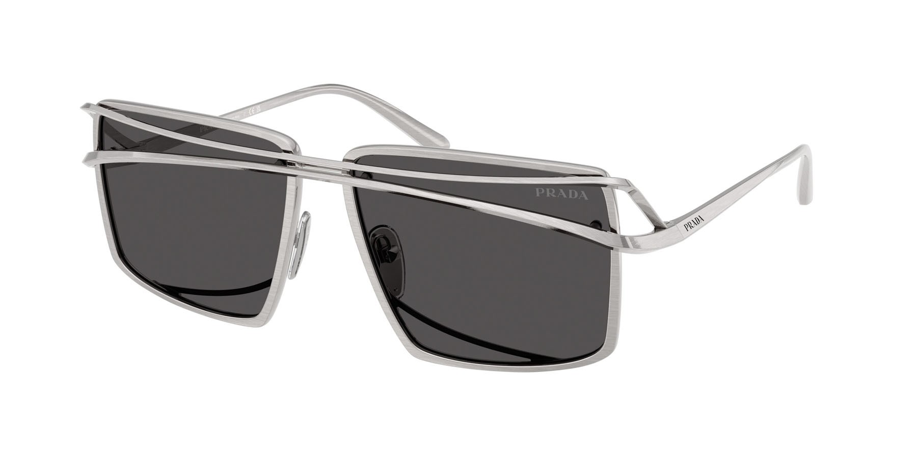 Occhiali da sole Prada PR C55S (28C08Z) colore argento vintage forma irregolare lenti grigio scuro