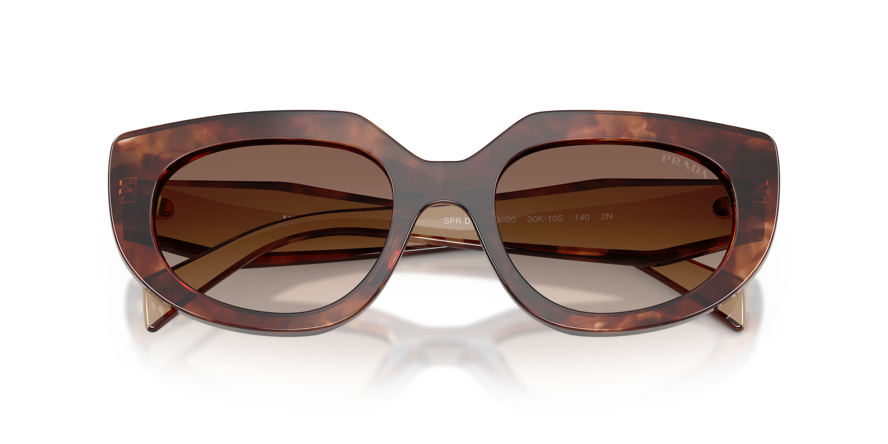 Occhiali da sole Prada PR D02S (00K10S) colore caramello tartarugato forma ovale lenti marrone sfumato