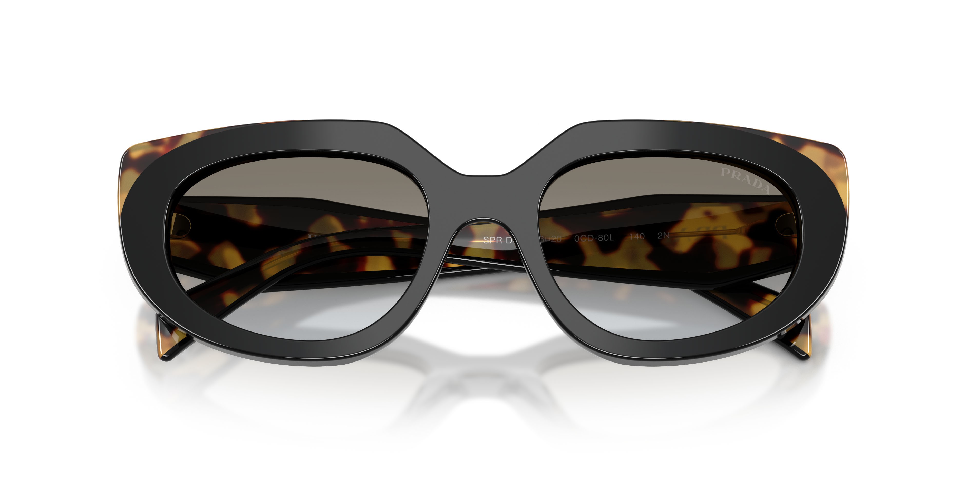 Sunglasses Prada PR D02S (0CD80L) color nero/tartarugato medio shape oval lenses sfumato grigio