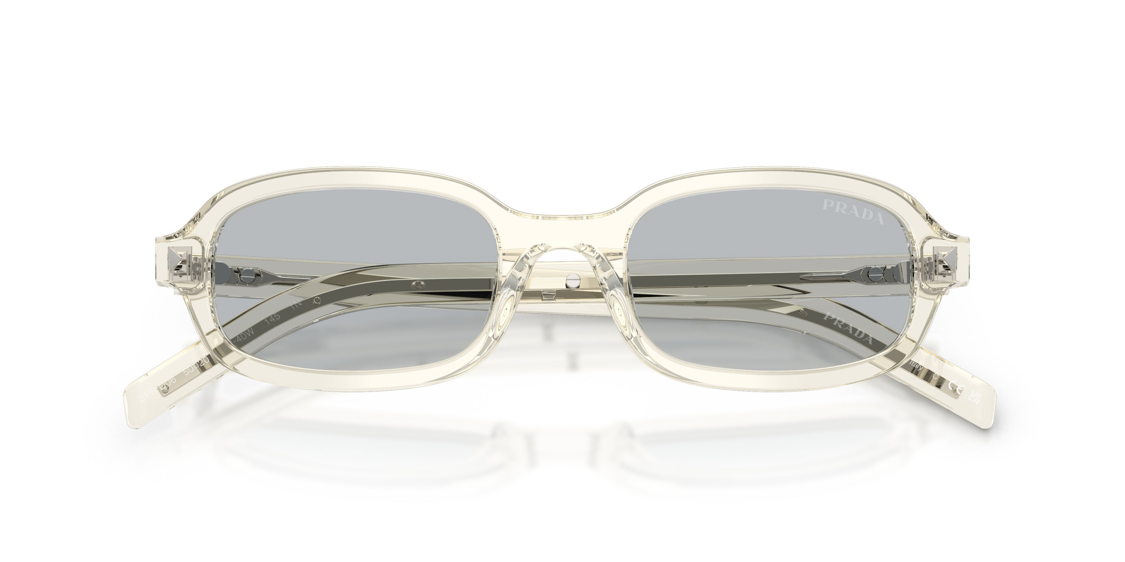 Occhiali da sole Prada PR D06S (12X40W) colore champagne trasparente forma ovale lenti grigio chiaro
