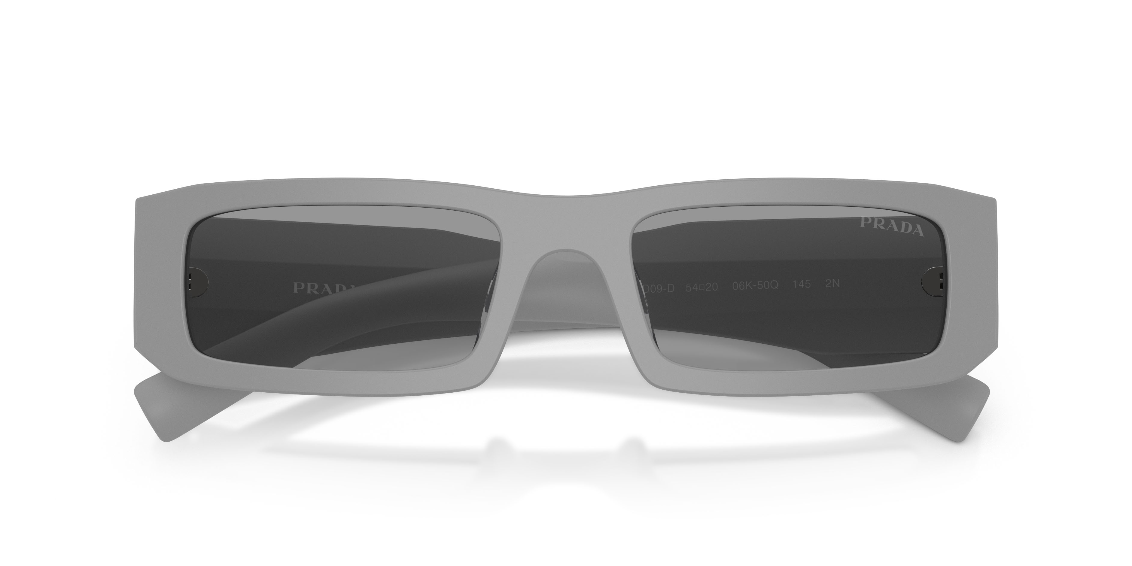Occhiali da sole Prada PR D09SD (06K50Q) colore cemento opaco forma rettangolare lenti grigio