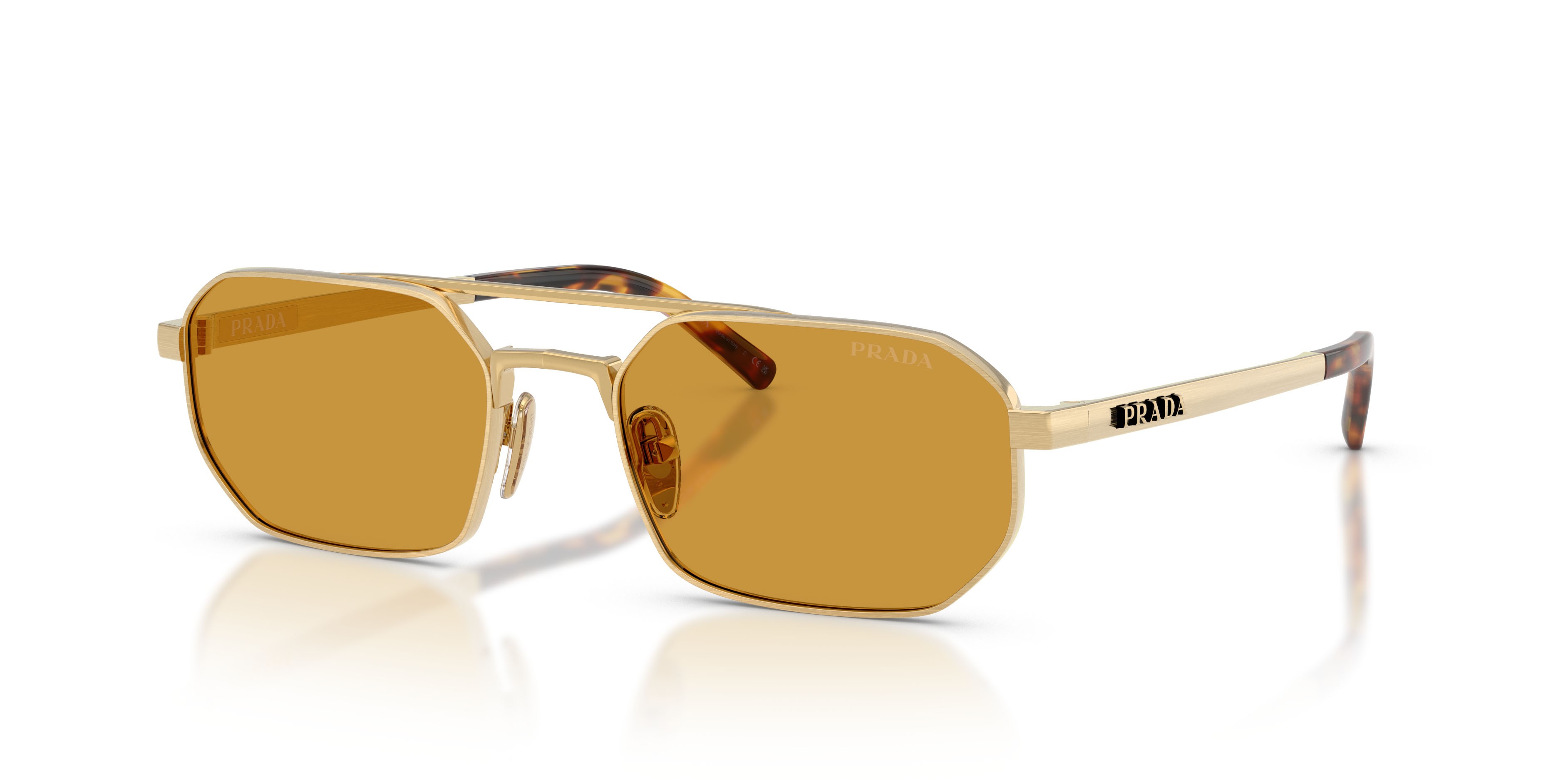 Occhiali da sole Prada PR D53S (24J50P) colore oro satinato forma irregolare lenti miele scuro