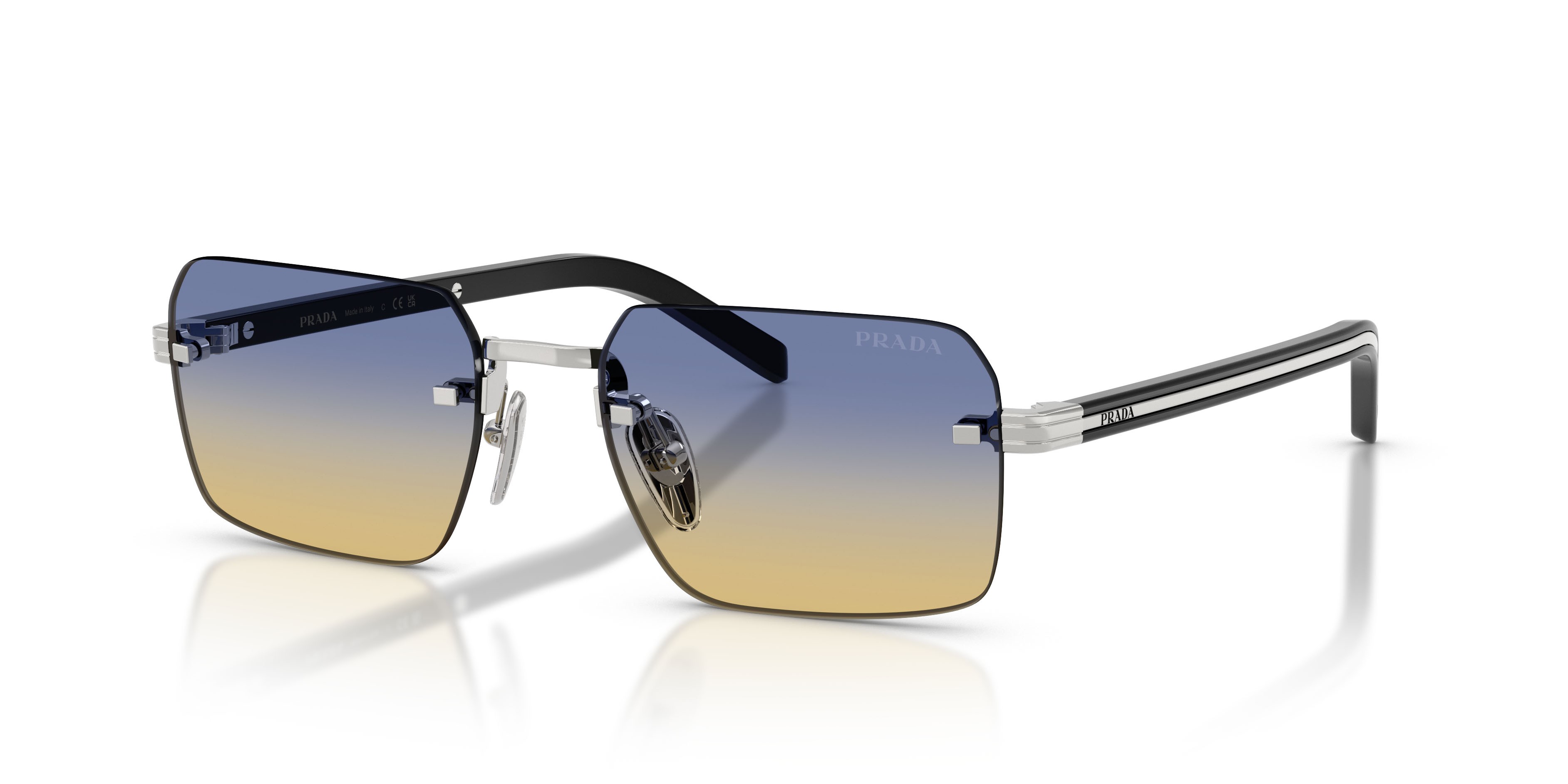 Occhiali da sole Prada PR D55S (1BC50E) colore argento forma rettangolare lenti yellow/dark blue