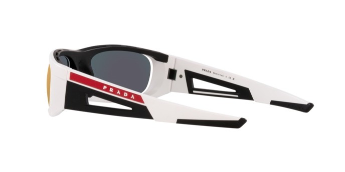 Occhiali da sole Prada Linea Rossa PS 02YS (AAI04U) colore bianco opaco/nero forma irregolare lenti orange multilayer tuning