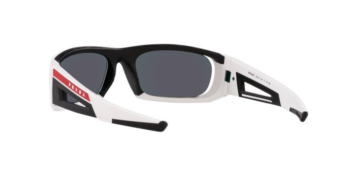 Occhiali da sole Prada Linea Rossa PS 02YS (AAI04U) colore bianco opaco/nero forma irregolare lenti orange multilayer tuning