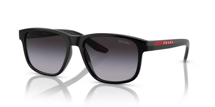 Occhiali da sole Prada Linea Rossa PS 06YS (1AB09U) colore nero forma quadrato lenti sfumato grigio