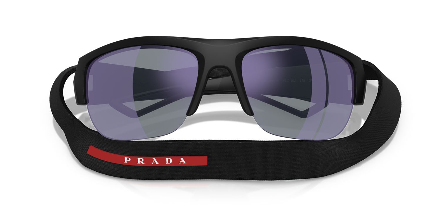 Occhiali da sole Prada Linea Rossa PS A01S (1BO10J) colore nero opaco forma quadrato lenti blu scuro specchiata viola