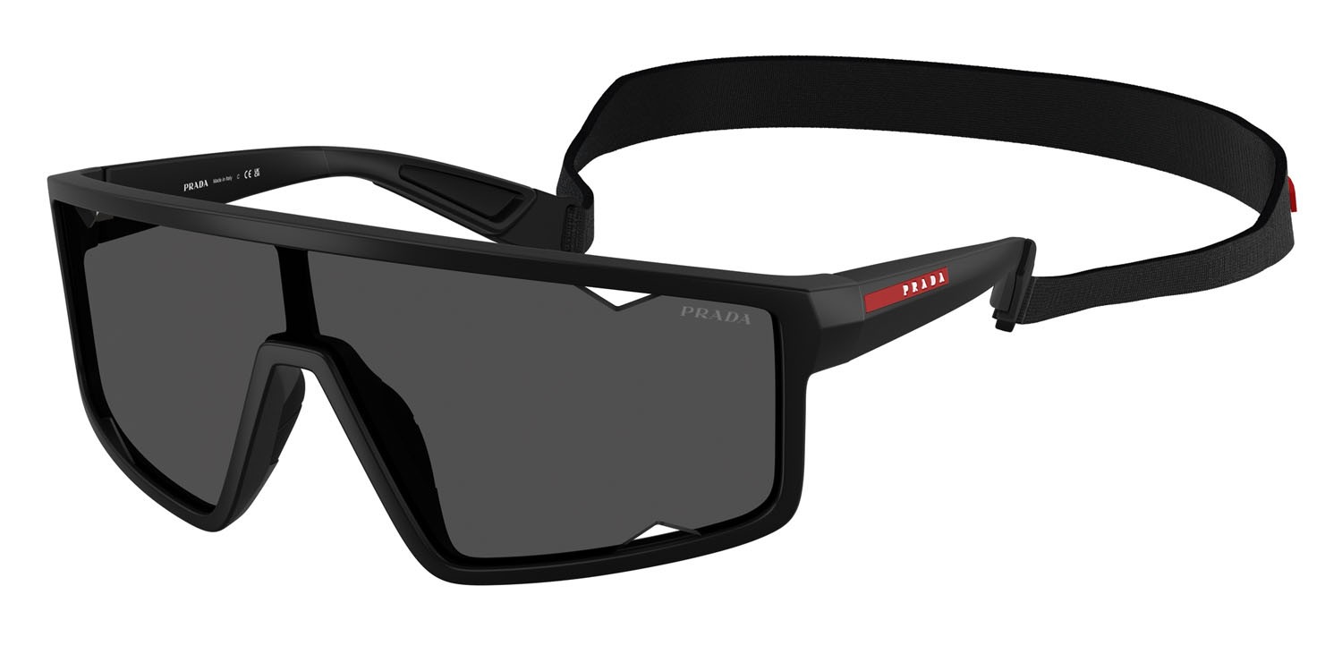 Occhiali da sole Prada Linea Rossa PS A03S (1BO5S0) colore nero opaco forma rettangolare lenti grigio scuro