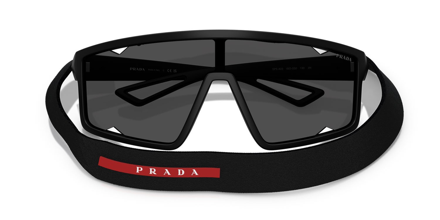 Occhiali da sole Prada Linea Rossa PS A03S (1BO5S0) colore nero opaco forma rettangolare lenti grigio scuro