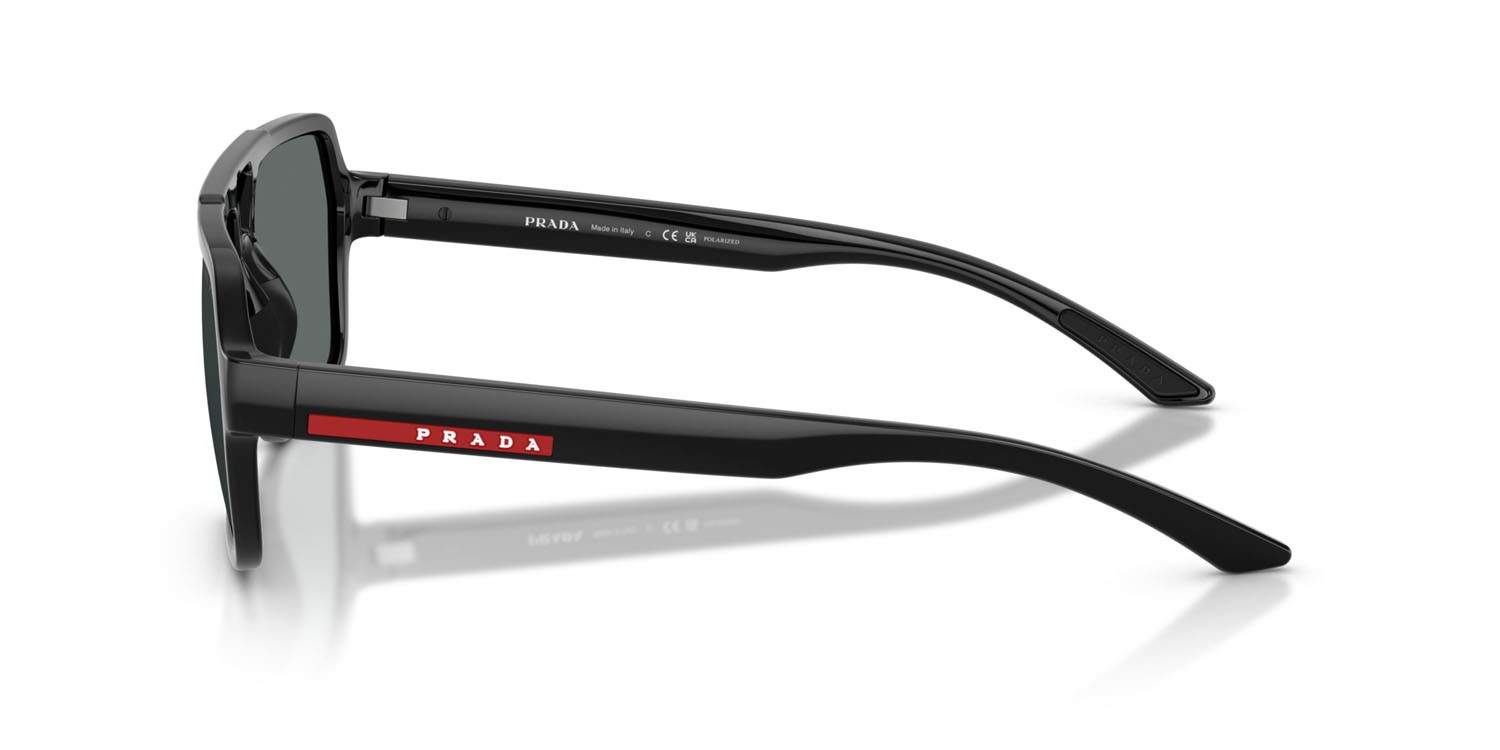 Occhiali da sole Prada Linea Rossa PS A06S (1AB02G) colore nero forma aviator lenti polar grigio scuro