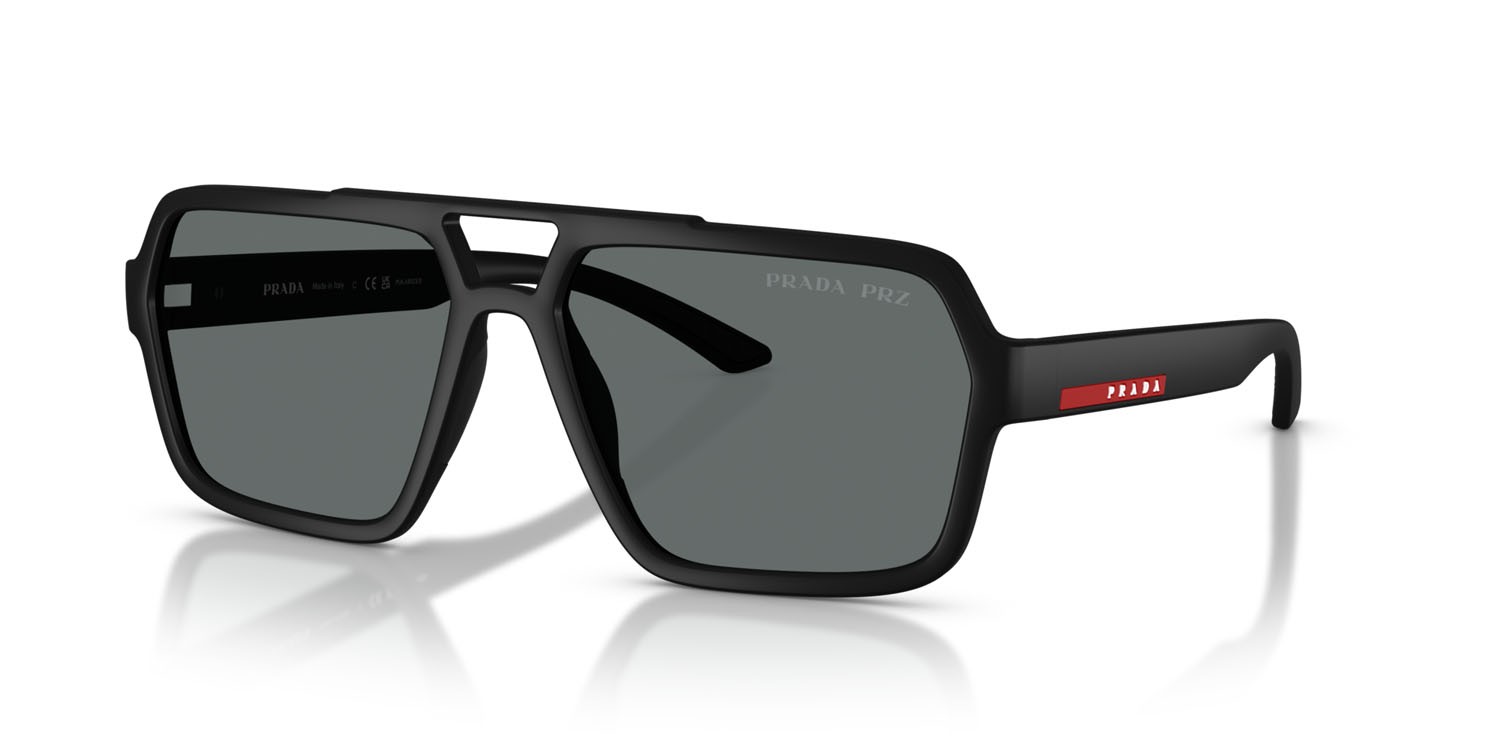 Occhiali da sole Prada Linea Rossa PS A06S (DG002G) colore nero effetto gommato forma aviator lenti polar grigio scuro