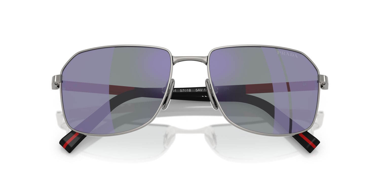 Occhiali da sole Prada Linea Rossa PS A51S (5AV10J) colore gunmetal forma rettangolare lenti blu scuro specchiata viola