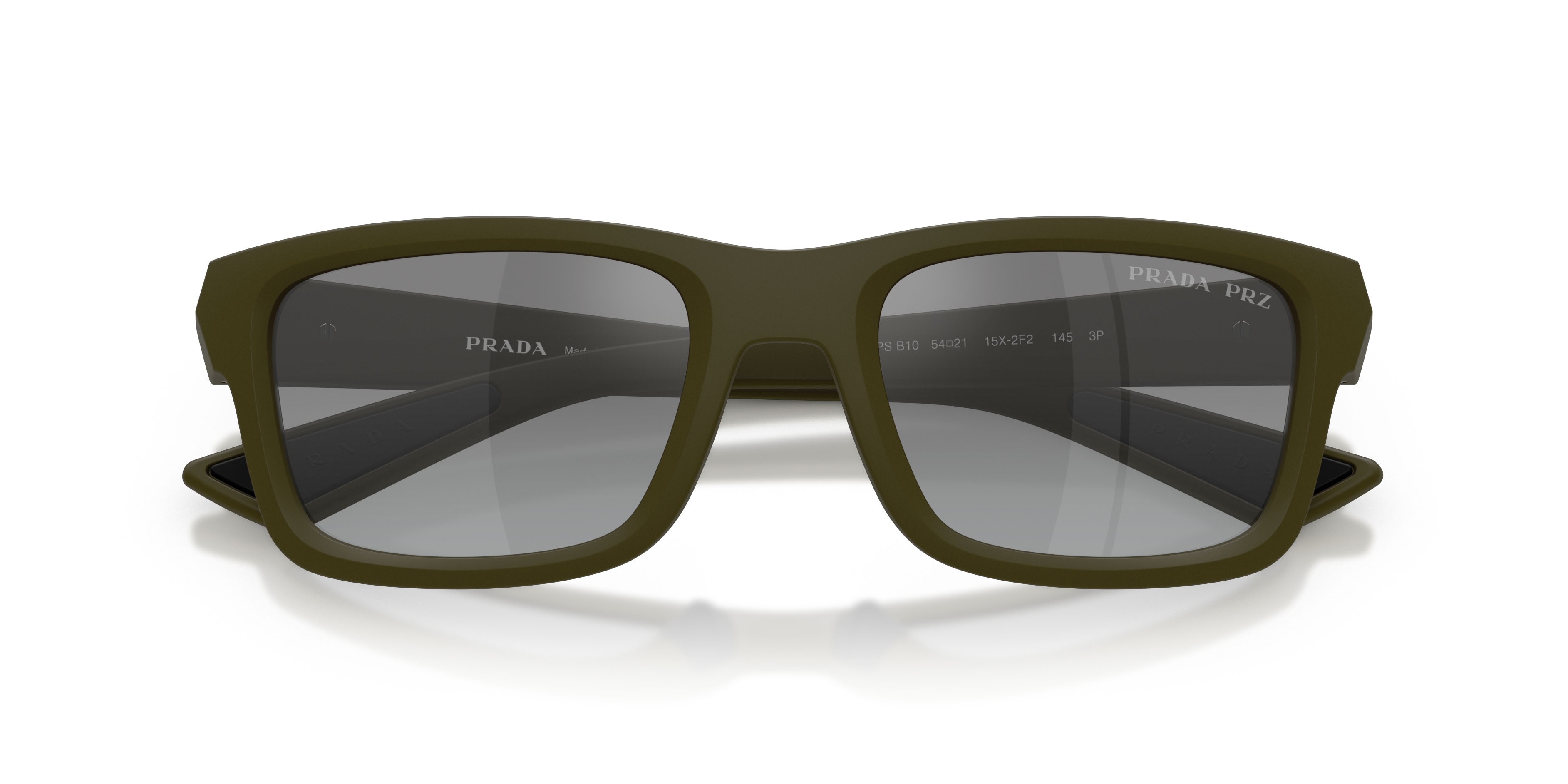 Occhiali da sole Prada Linea Rossa PS B10S (15X2F2) colore verde opaco forma irregolare lenti grigio sfumato specchiato