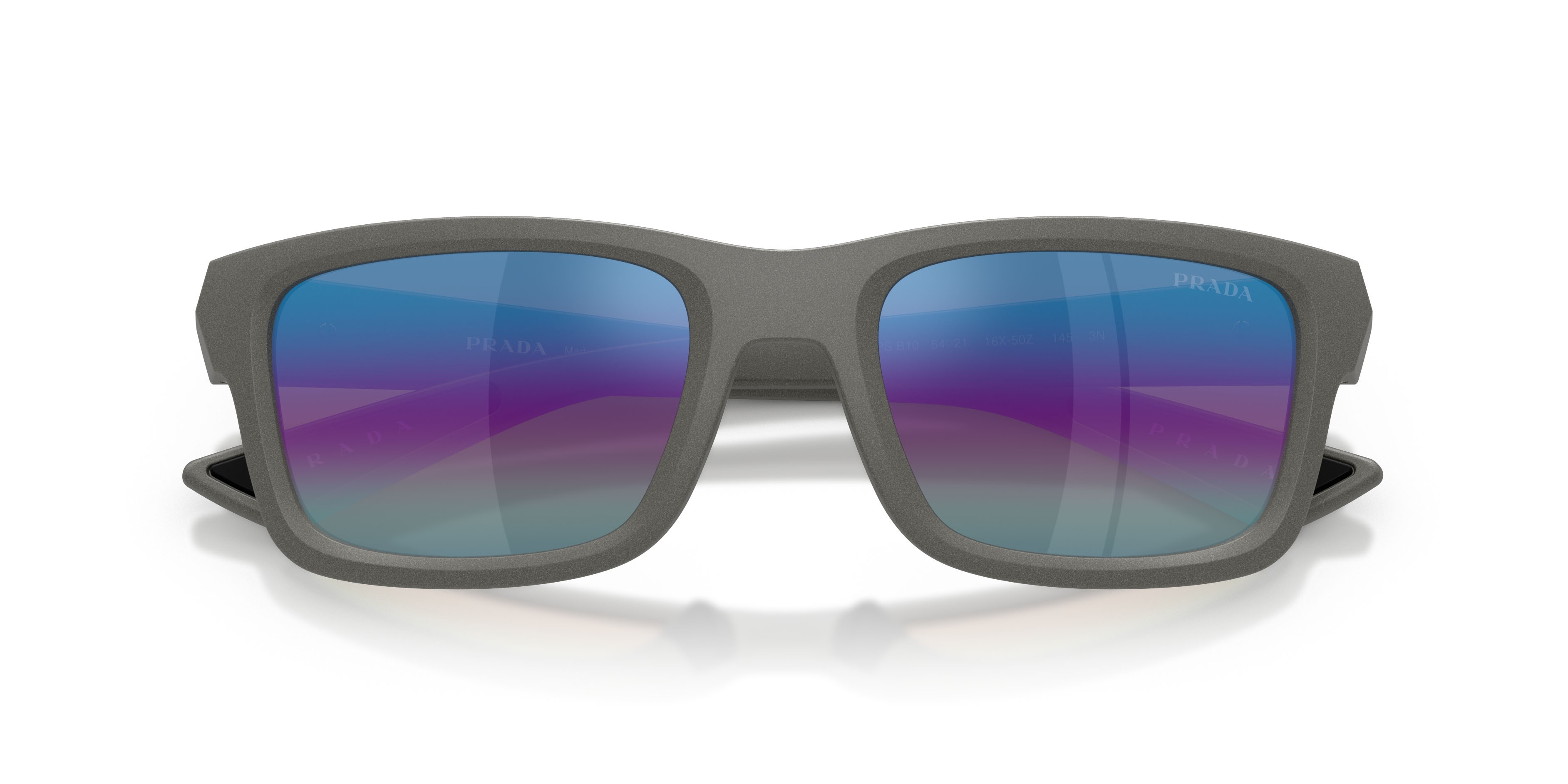 Occhiali da sole Prada Linea Rossa PS B10S (16X50Z) colore silver metal forma irregolare lenti violetto sfumato argento