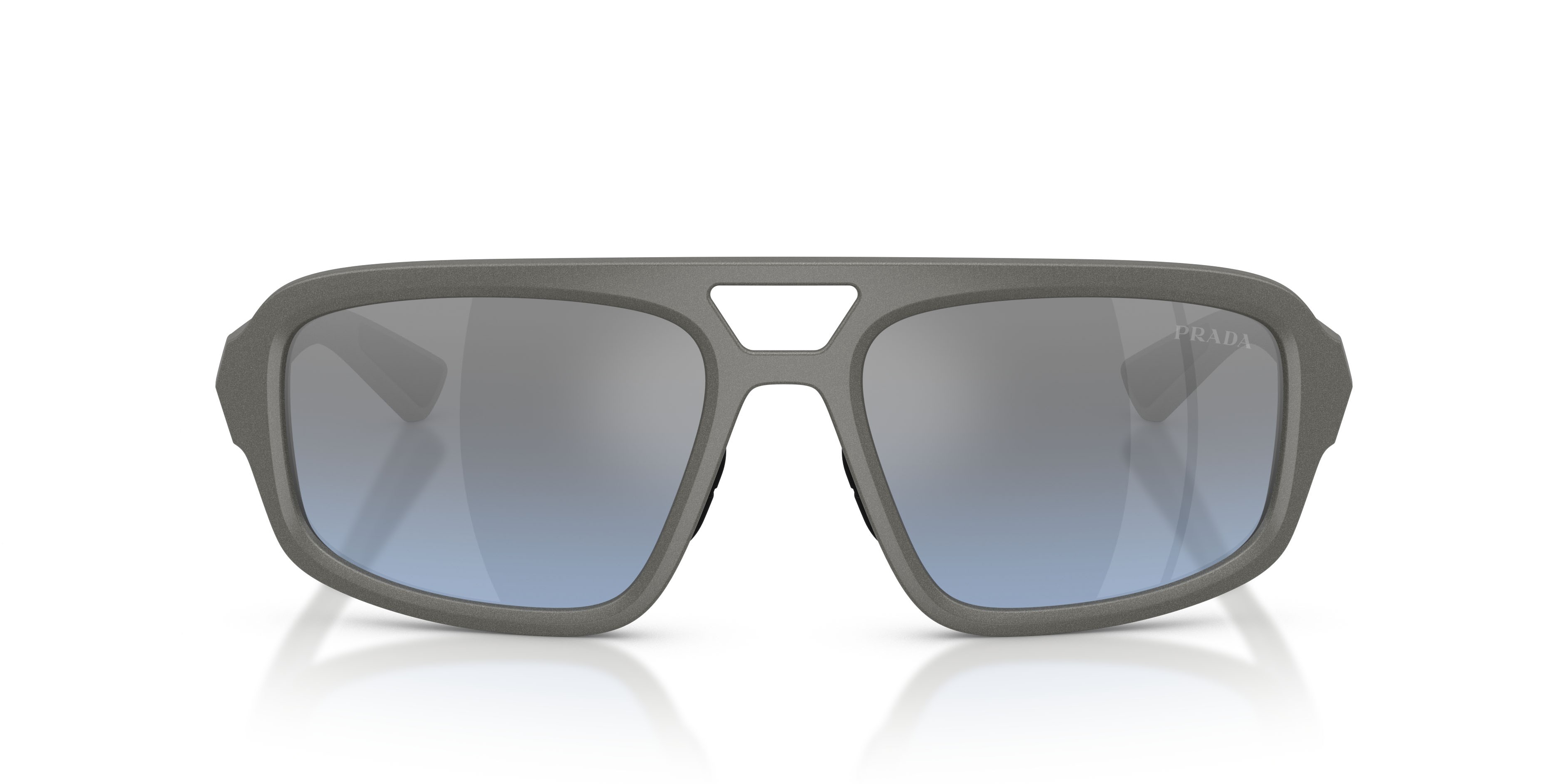 Occhiali da sole Prada Linea Rossa PS B11SU (16X11A) colore grigio metallizzato forma irregolare lenti celeste sfumato argento a specchio