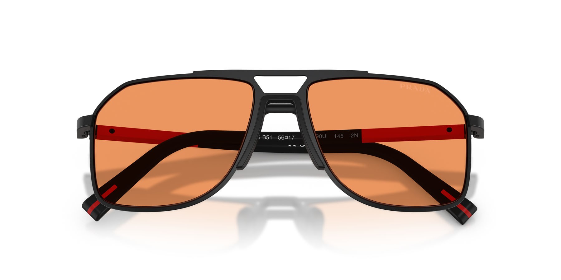 Occhiali da sole Prada Linea Rossa PS B51S (1BO90U) colore nero opaco forma aviator lenti arancione