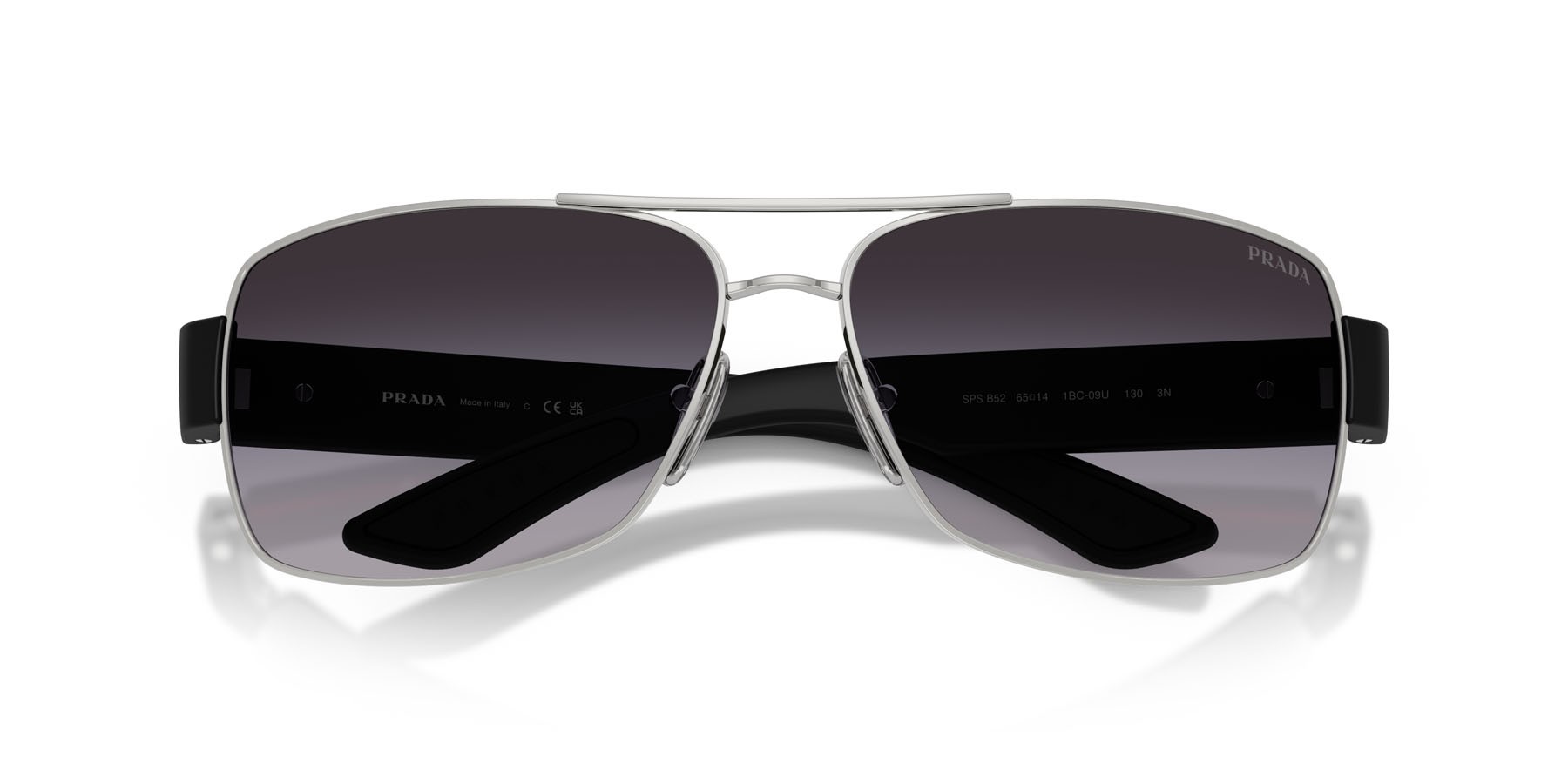 Occhiali da sole Prada Linea Rossa PS B52S (1BC09U) colore argento forma irregolare lenti sfumato grigio