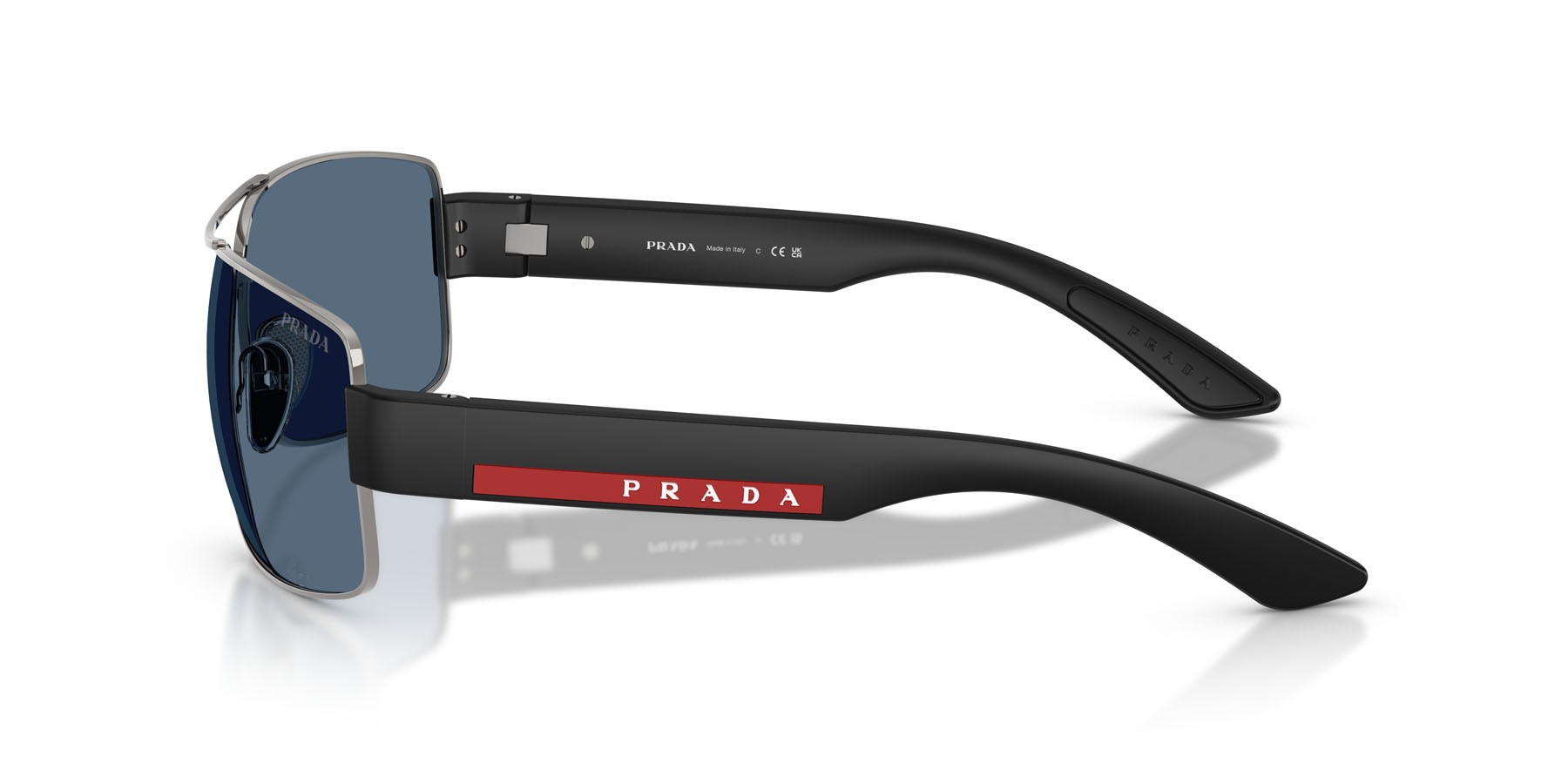 Occhiali da sole Prada Linea Rossa PS B52S (5AV06A) colore gunmetal forma irregolare lenti blu scuro