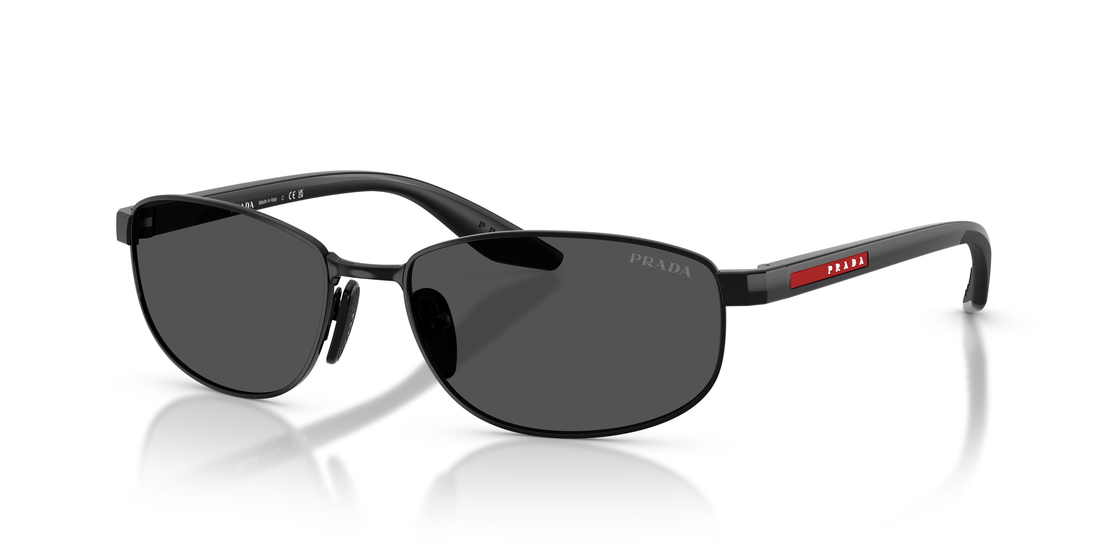 Occhiali da sole Prada Linea Rossa PS B53S (1AB08Z) colore nero forma ovale lenti nero pieno