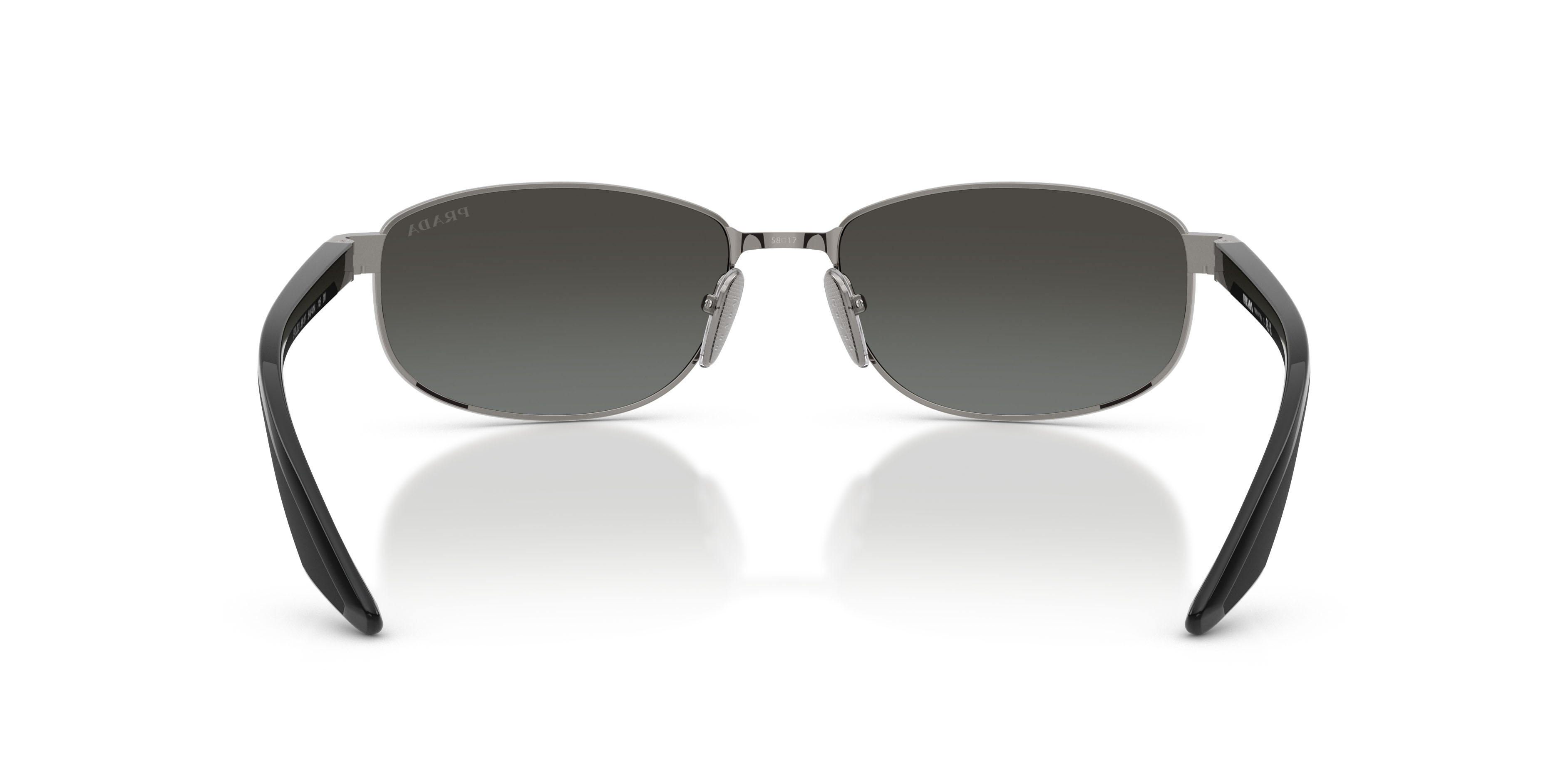 Occhiali da sole Prada Linea Rossa PS B53S (5AV41A) colore grigio metallizzato forma ovale lenti grigio sfumato argento a specchio