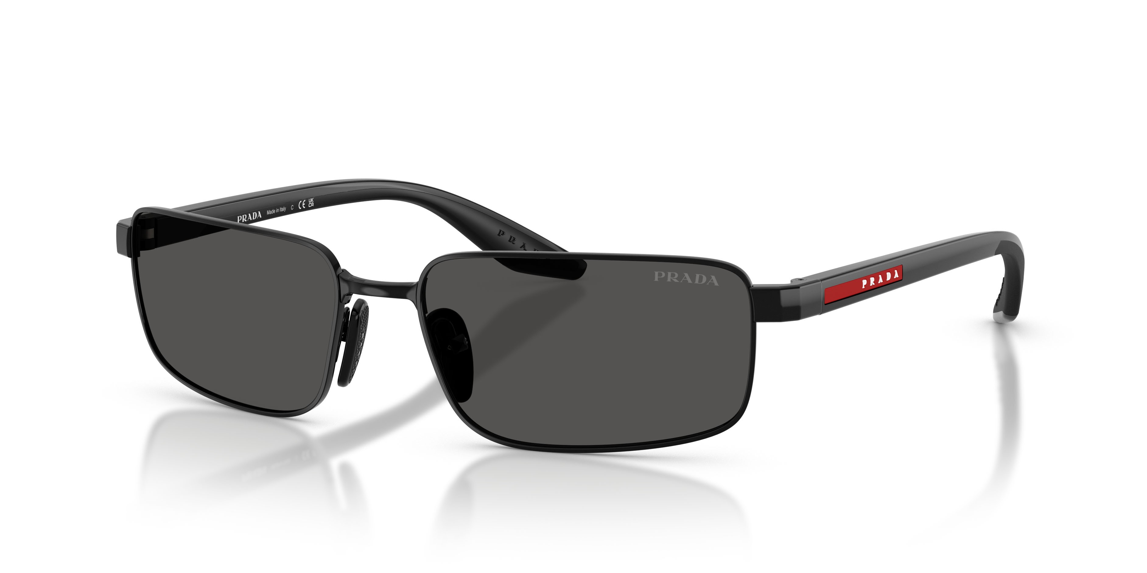 Occhiali da sole Prada Linea Rossa PS B54S (1AB08Z) colore nero forma rettangolare lenti grigio scuro