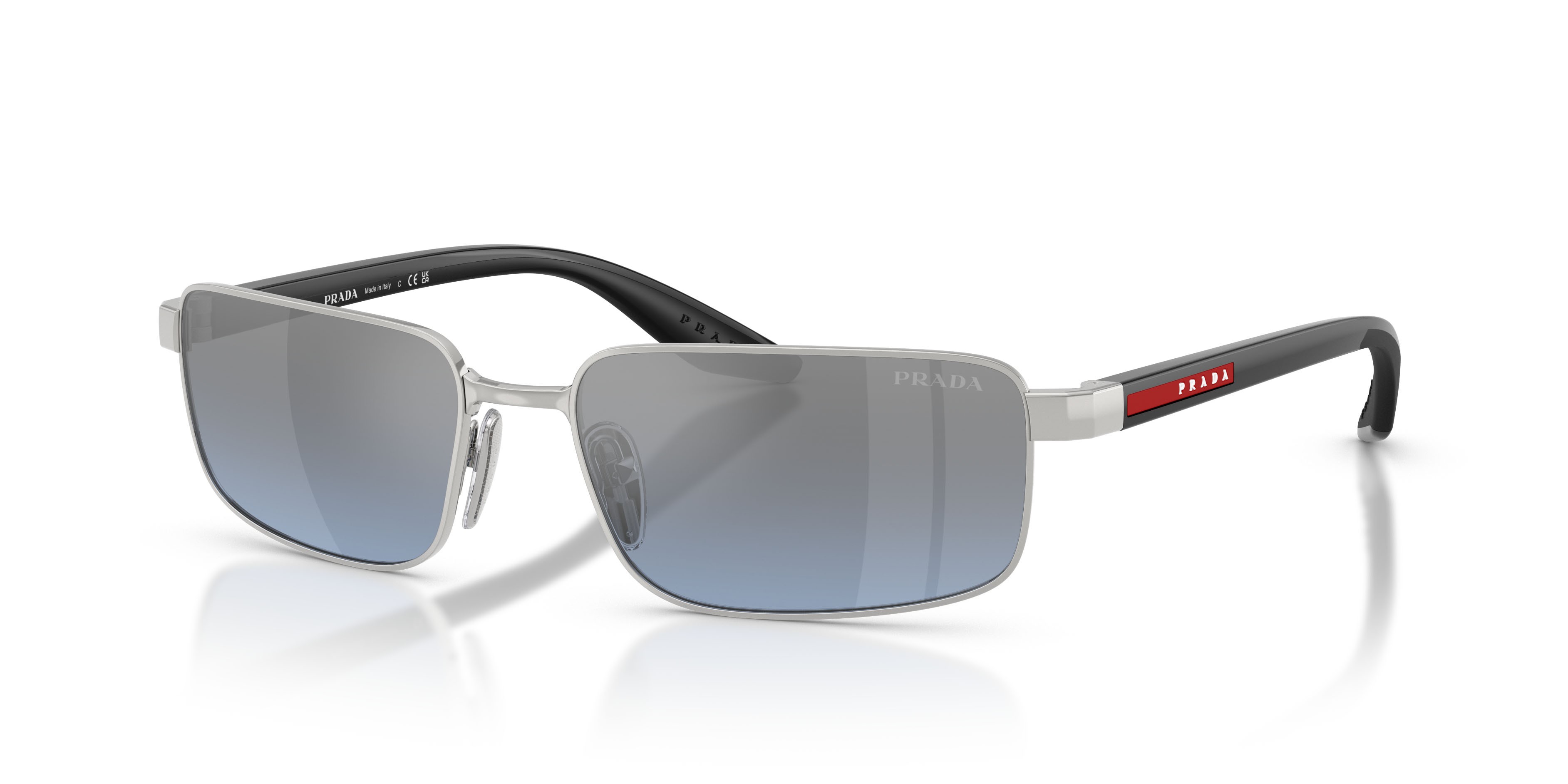 Occhiali da sole Prada Linea Rossa PS B54S (1BC11A) colore argento forma rettangolare lenti blu/specchiata argento