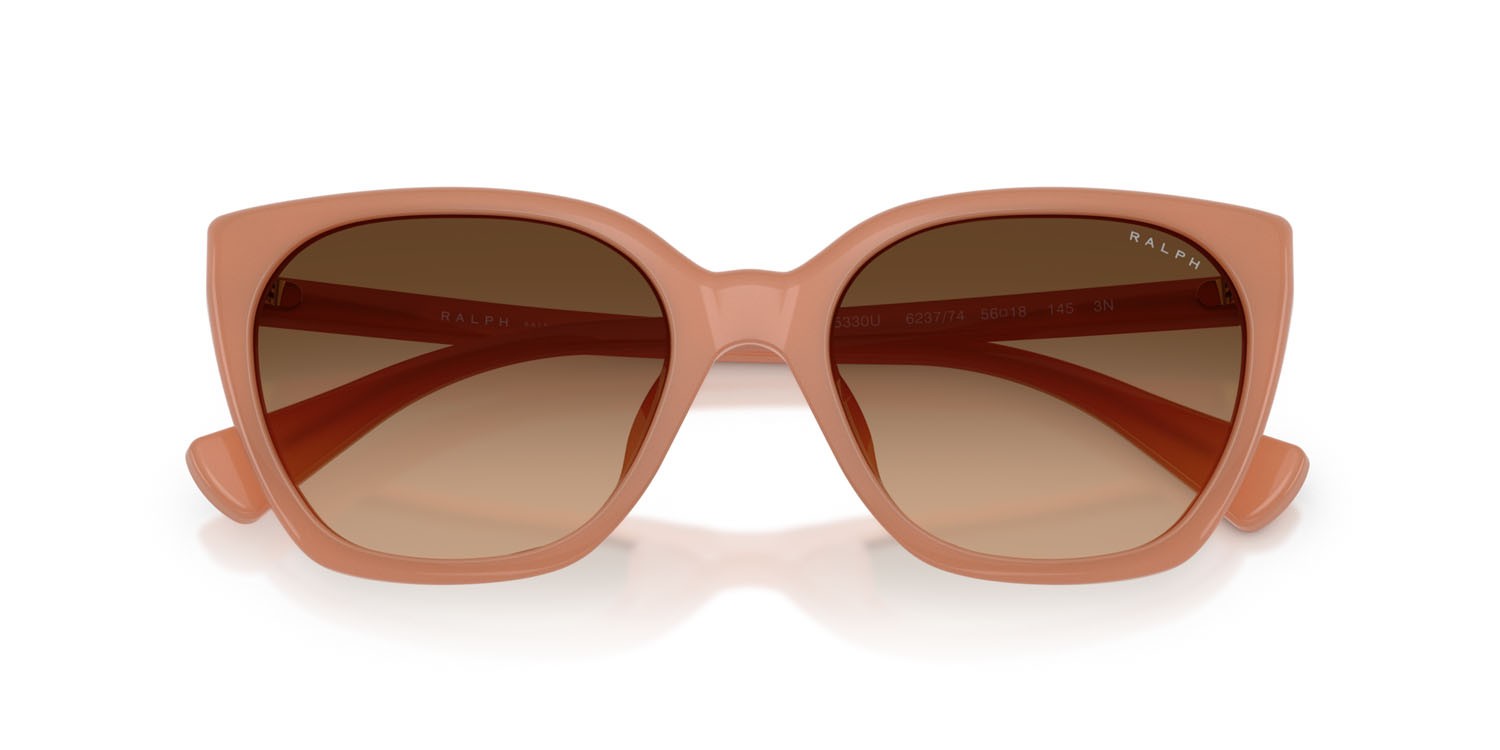 Sunglasses Ralph RA 5330U (623774) color pesca latte lucido shape butterfly lenses marrone sfumato