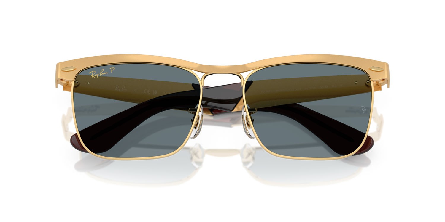 Occhiali da sole Ray-Ban Wayfarer Deluxe RB 3875 (92763R) colore sandblasted legend oro forma quadrato lenti polarizzata blu scuro