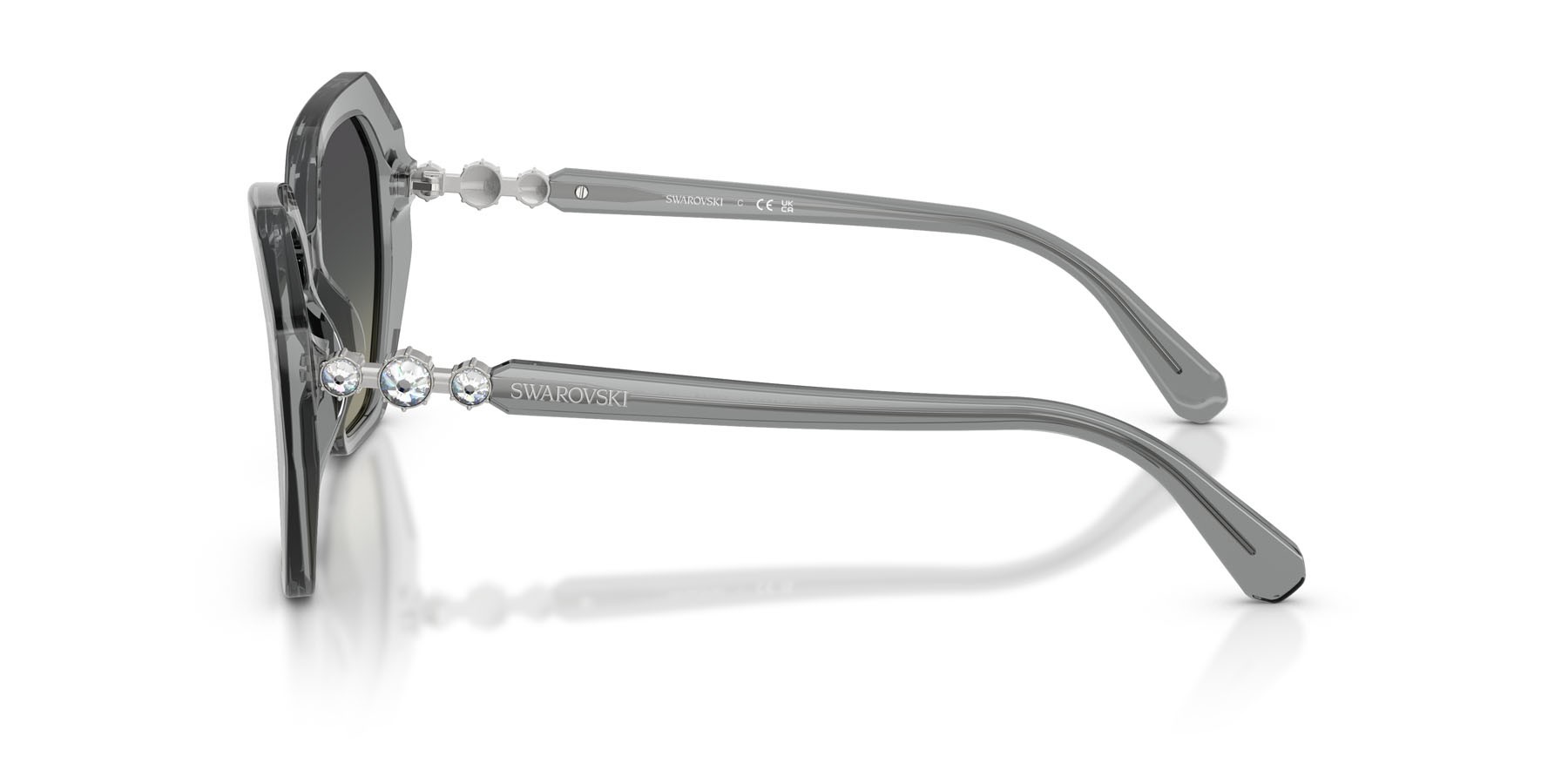 Sunglasses Swarovski SK 6017 (106211) color grigio trasparente shape irregular lenses grigio sfumato