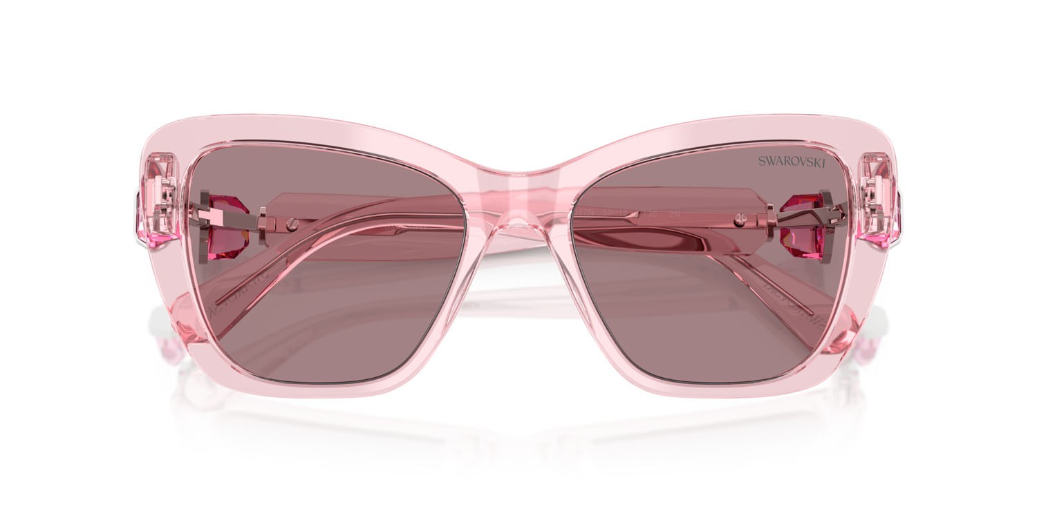 Sunglasses Swarovski SK 6018 (30017N) color rosa trasparente shape cat eye lenses viola chiaro/marrone