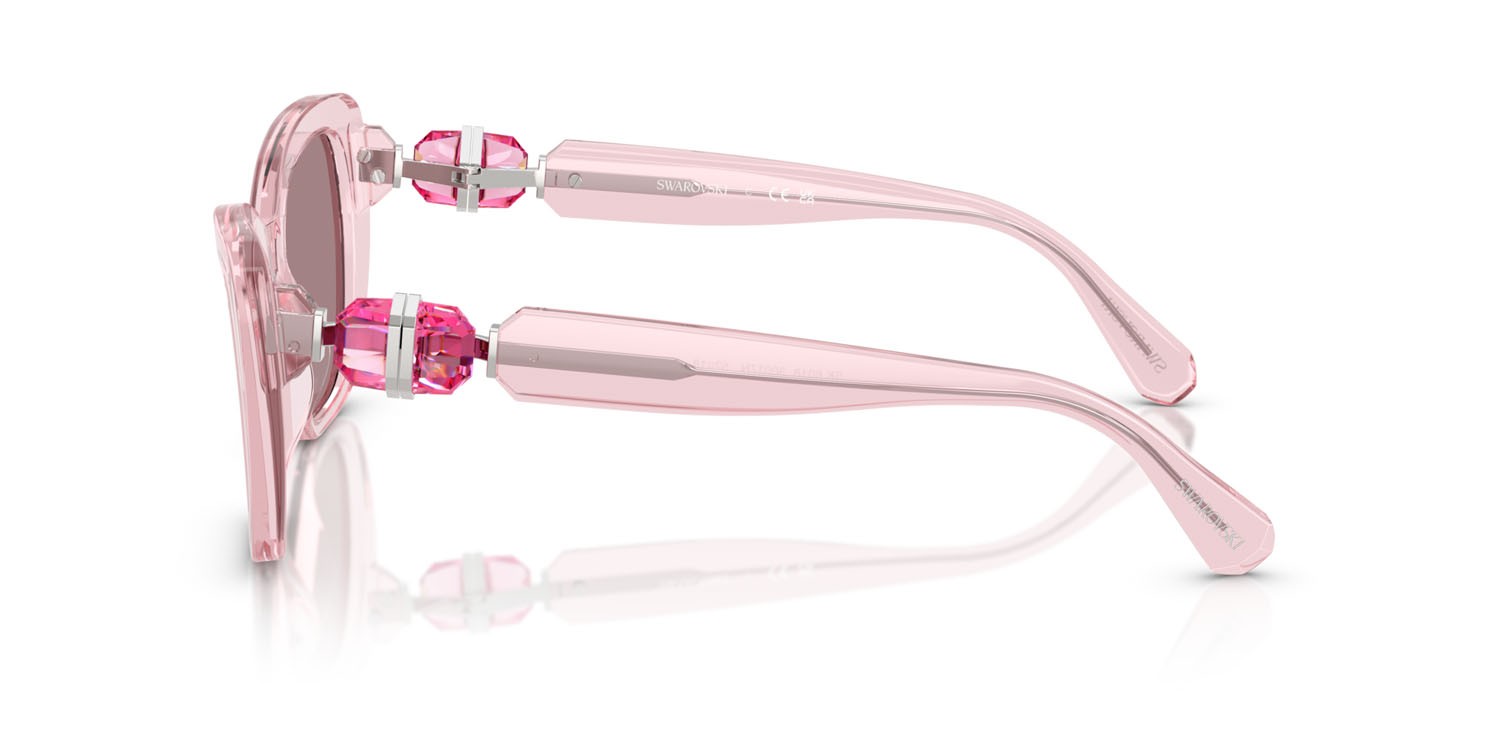 Sunglasses Swarovski SK 6018 (30017N) color rosa trasparente shape cat eye lenses viola chiaro/marrone